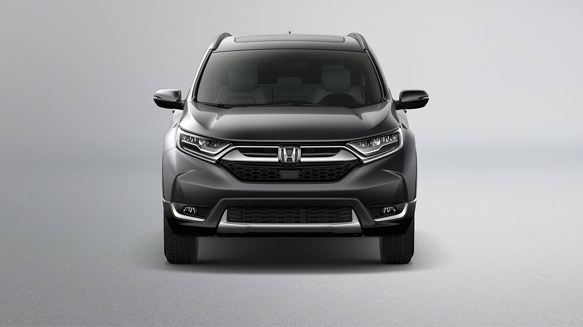 Front view of 2019 Honda CR-V Touring in Gunmetal Metallic showing full LED headlights with auto-on/off.