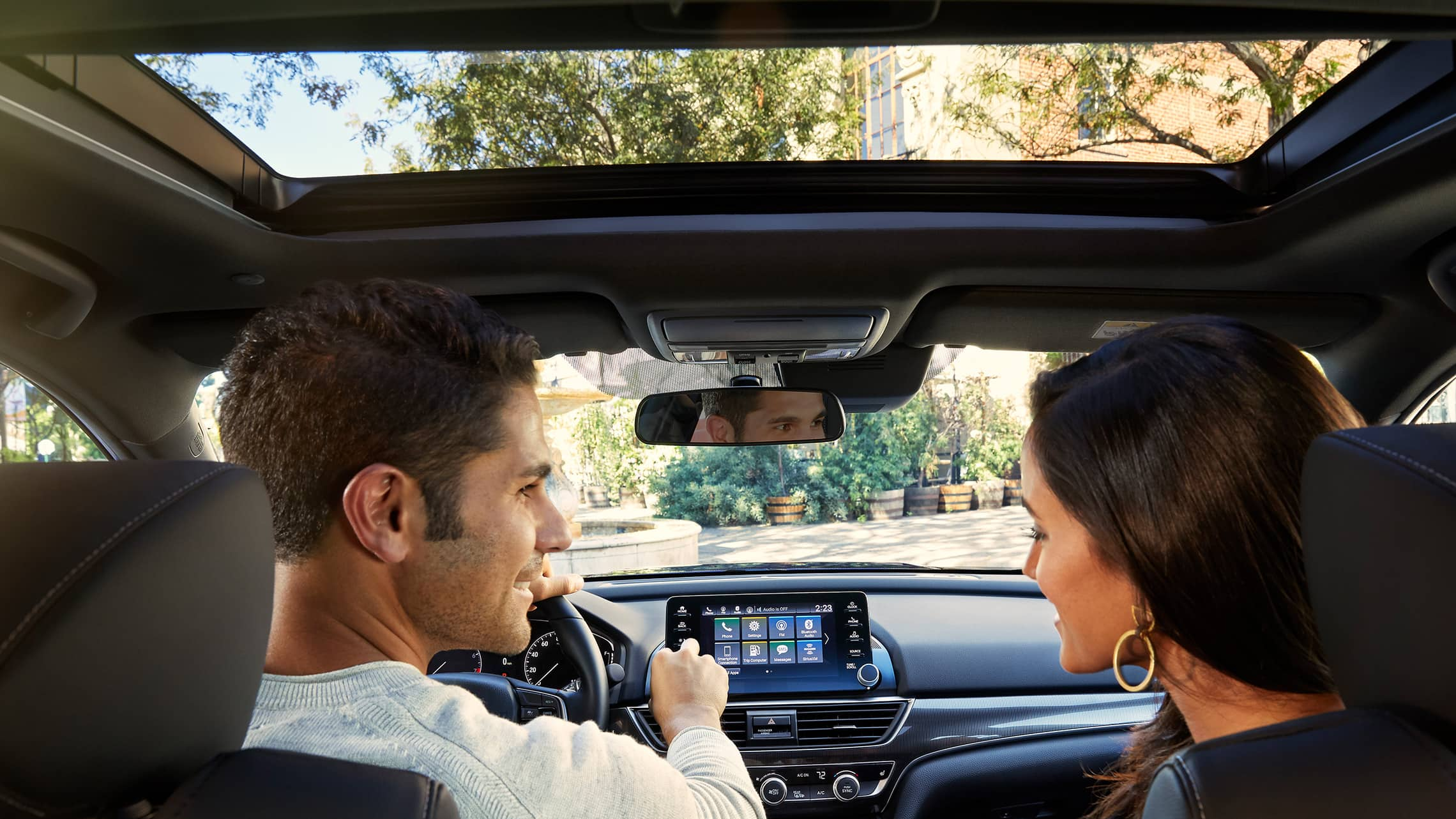 Interior rear-seat view of one-touch power moonroof detail shown open in the 2021 Honda Accord Sport 2.0T.